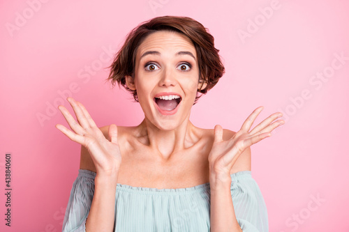 Photo of young excited girl happy positive smile amazed shocked surprised news sale isolated over pastel color background