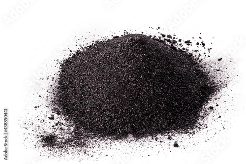 graphite powder used in industry, black powder with isolated white background and copy space. photo