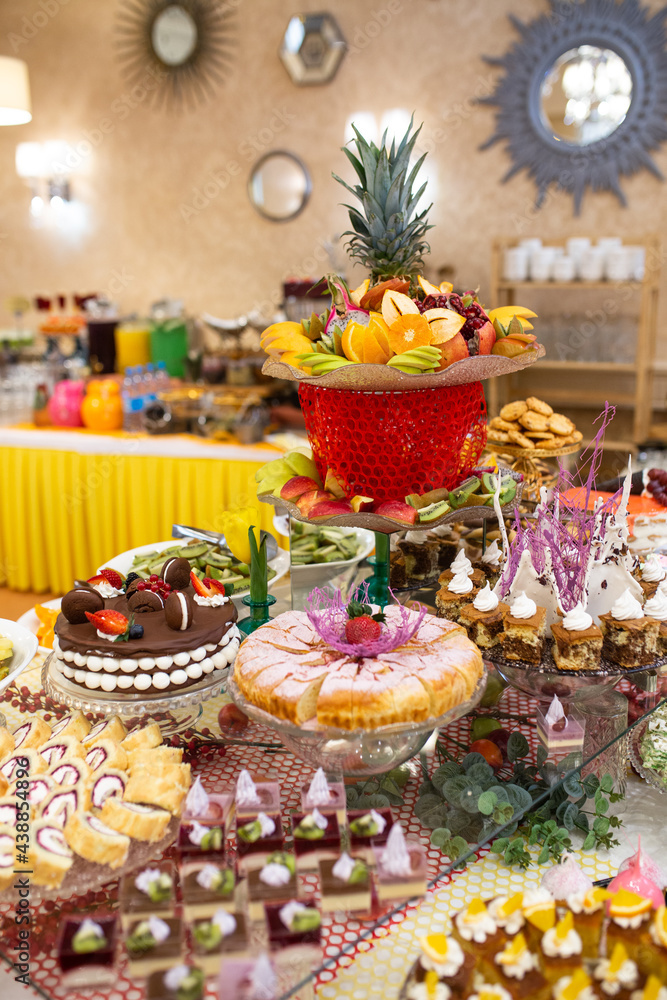 Table of sweets at a children's party in a cafe