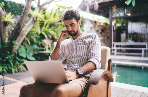 Young man looking for information on internet