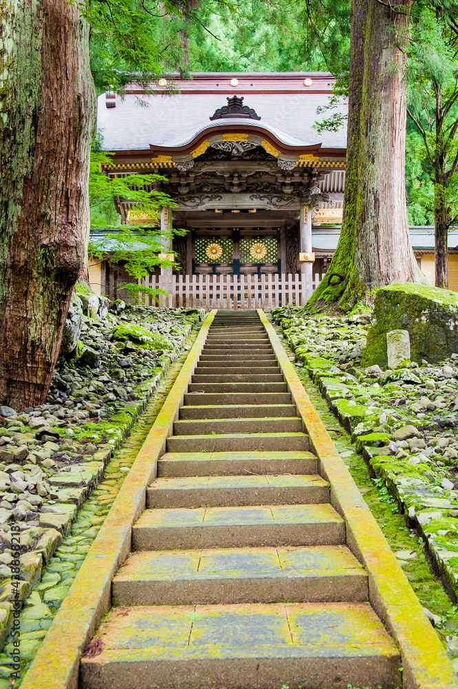 Staircase of a beautiful ancient Buddhist temple, located among the mountains in the interior of Japan Staircase of a beautiful ancient Buddhist temple, located among the mountains in the interior of Japan