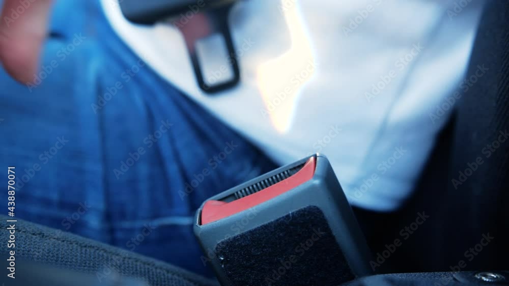 Woman driver Unlocking a 3-point car seat belt in car. Stock Video ...