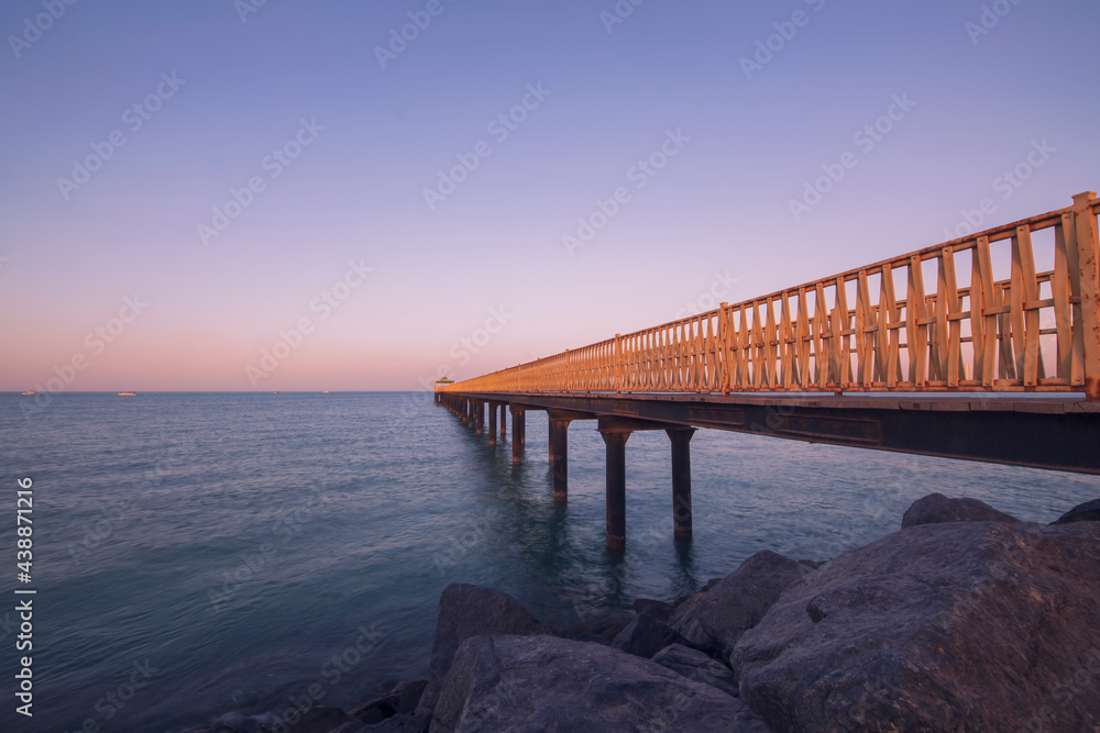 Long steal bridge in the sea for watching sunrise and sunset.