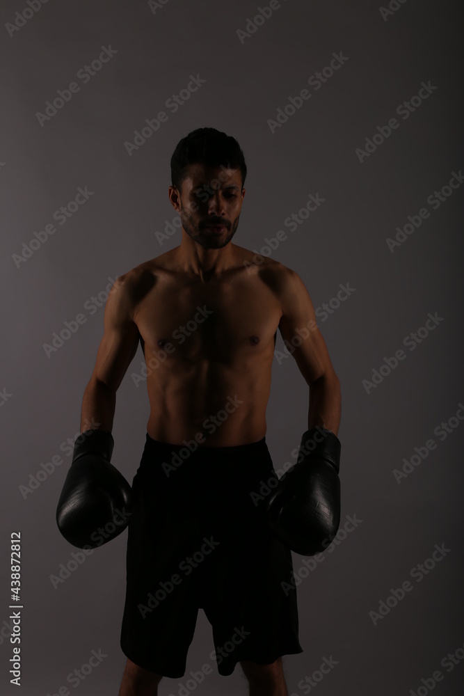 Portrait of a boxer in the shadows