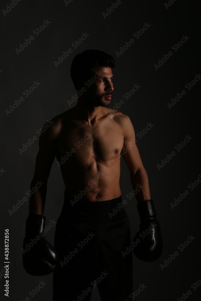 Portrait of a boxer in the shadows