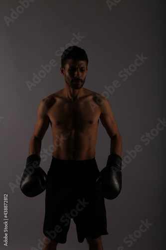 Portrait of a boxer in the shadows © Сергей Луговский