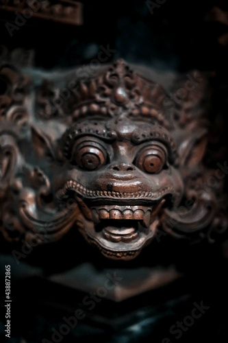 Balinese statue Stone figure of the God. Water Palace of Tirta Gangga in East Bali, Indonesia. © asauriet