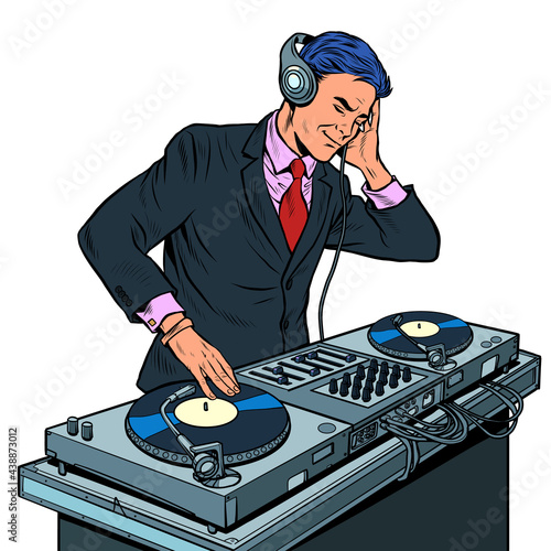 Male businessman dj on vinyl turntables. concert music performance