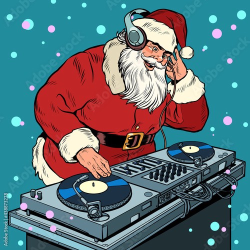 Santa Claus Christmas dj on vinyl turntables. concert music performance