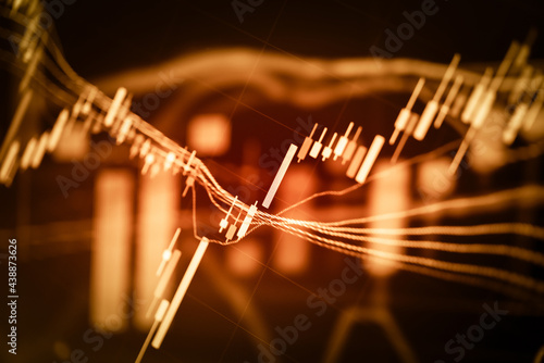 Photography Candlestick chart in financial stock market on digital number background