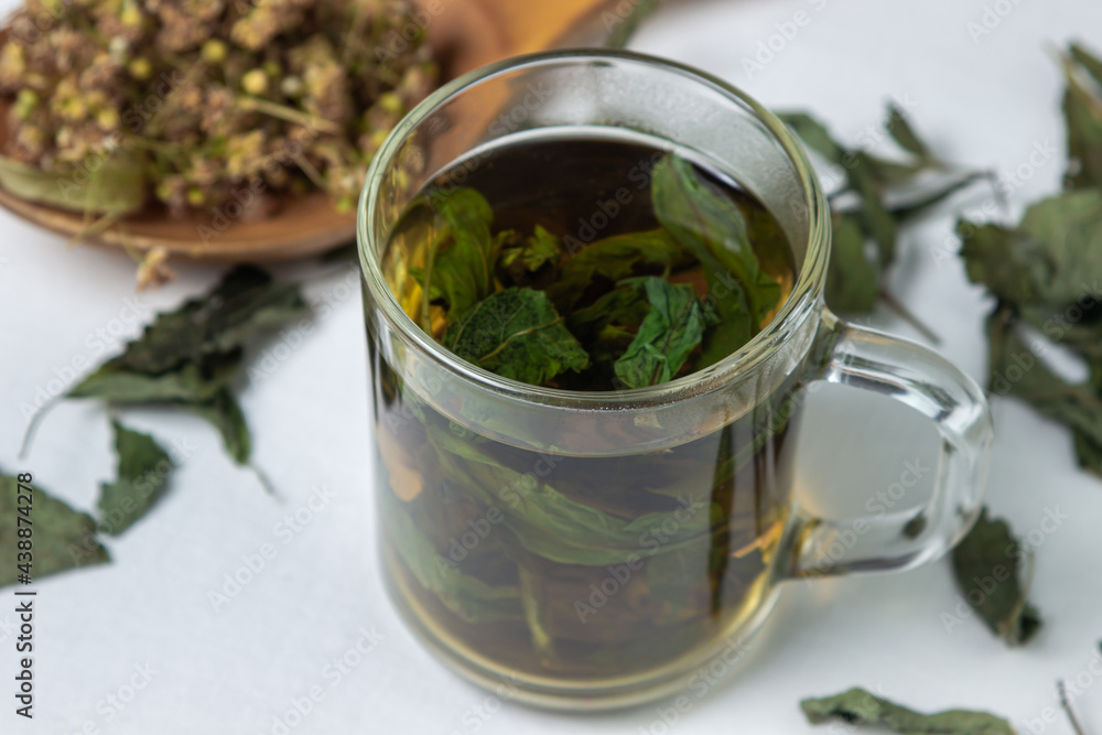 Herbal treatment. Brewed mint tea. Dried mint and linden Herbal treatment. Brewed mint tea. Dried mint and linden