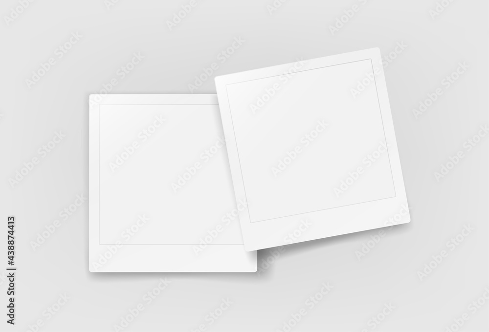 Two blank paper frames on a table Two blank paper frames on a table