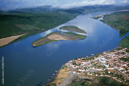 Rio São Francisco, o rio da integração nacional, na divisa entre Alagoas e Sergipe pouco antes de desaguar no mar. A cidade é Traipu. Nordeste, Brasil. photo