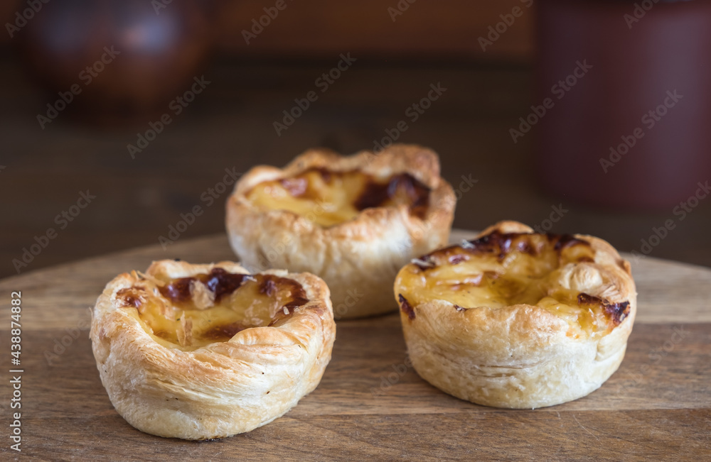 Three small quiche of homemade custard. Selective focus. Three small quiche of homemade custard. Selective focus.