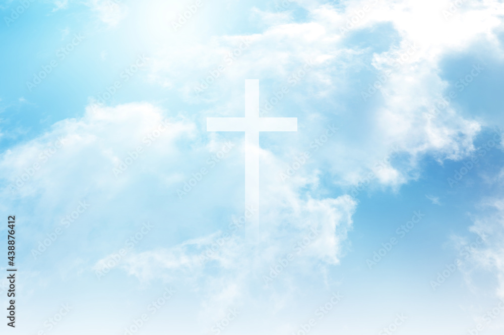 Christian cross appears bright in the sky background and soft clouds ...