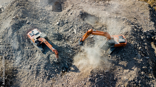 Excavator demolish building. View from above