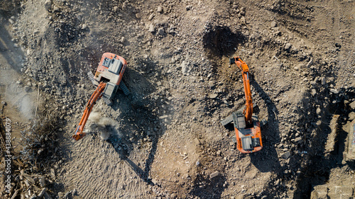 Excavator demolish building. View from above