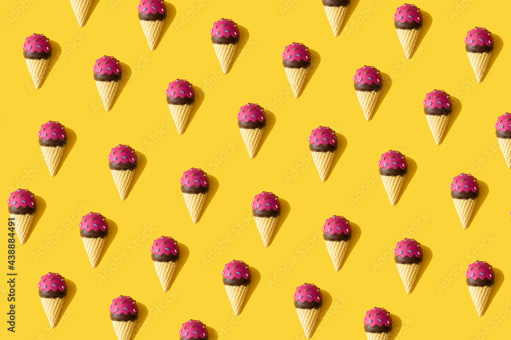 Creative summer pattern made with ice cream on yellow background. Minimal flat lay. Creative summer pattern made with ice cream on yellow background. Minimal flat lay.