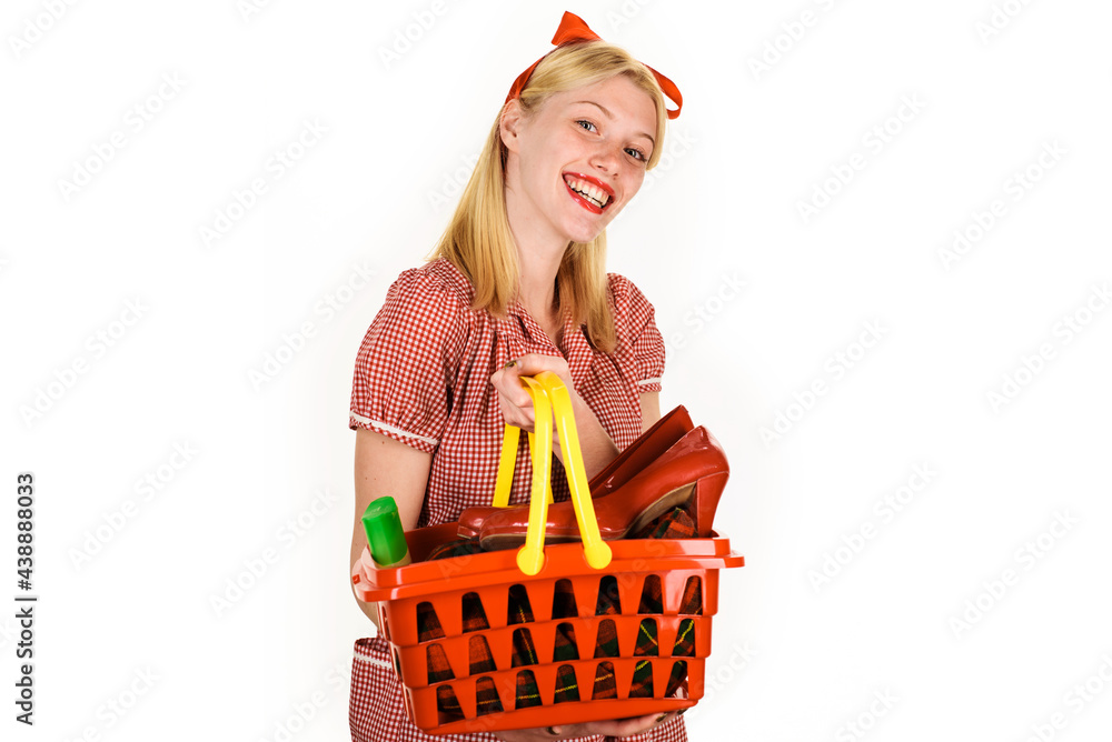 Smiling girl with shopping basket. Happy woman at supermarket. Buying spree. Female with shopping cart. Smiling girl with shopping basket. Happy woman at supermarket. Buying spree. Female with shopping cart.