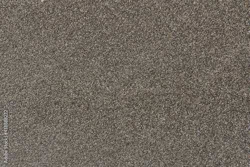 Grey sand gravel pebbles. Background texture of natural small pebbles.