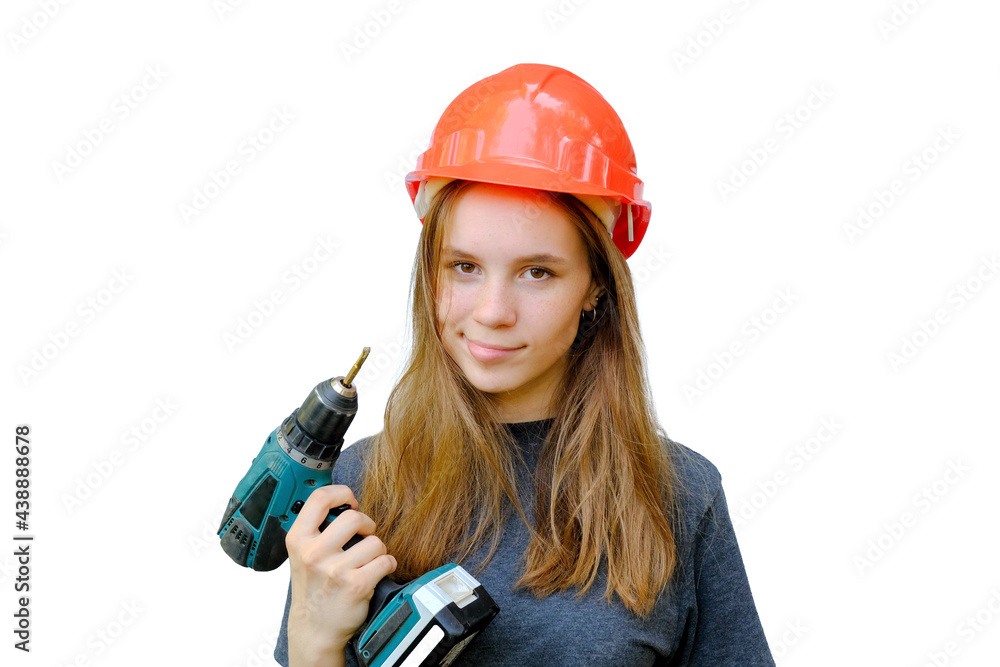 A cute girl in an orange hard hat holds a screwdriver in her hands. Funny facial expression, bewilderment. Isolated on white, horizontal photo. Portrait. A cute girl in an orange hard hat holds a screwdriver in her hands. Funny facial expression, bewilderment. Isolated on white, horizontal photo. Portrait.