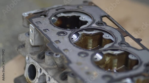Wallpaper Mural Disassembled motor engine of a car on a repair at the mechanic.The cylinder block of the four-cylinder engine. Closeup Torontodigital.ca
