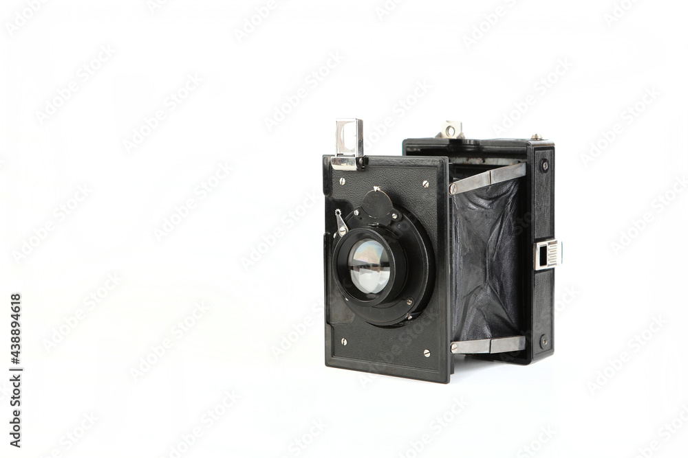 Old pre war large format scaling camera on white background. Old pre war large format scaling camera on white background.