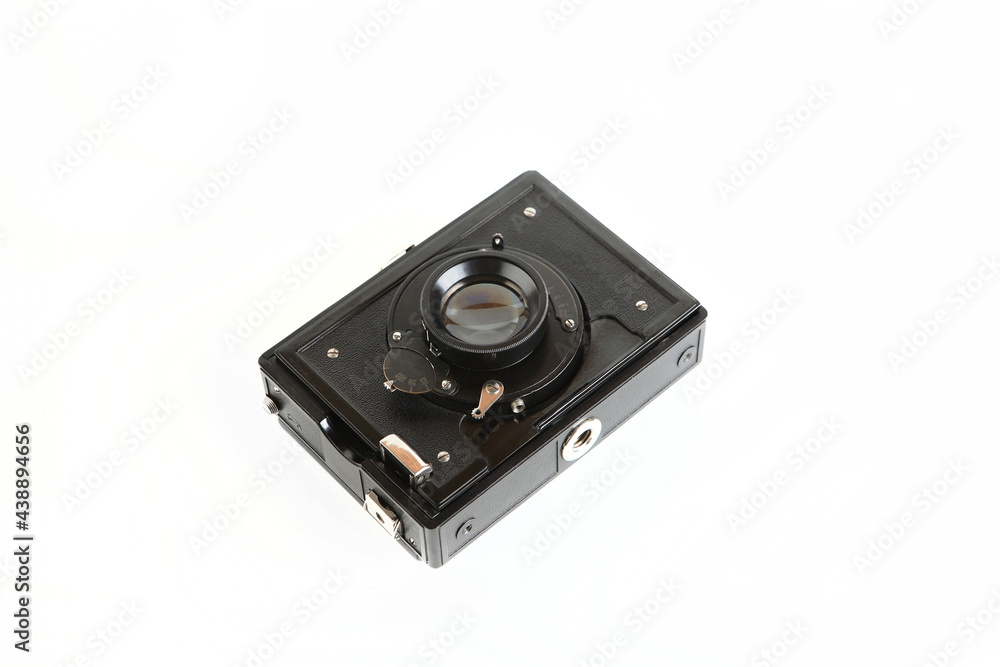 Old pre war large format scaling camera on white background. Old pre war large format scaling camera on white background.