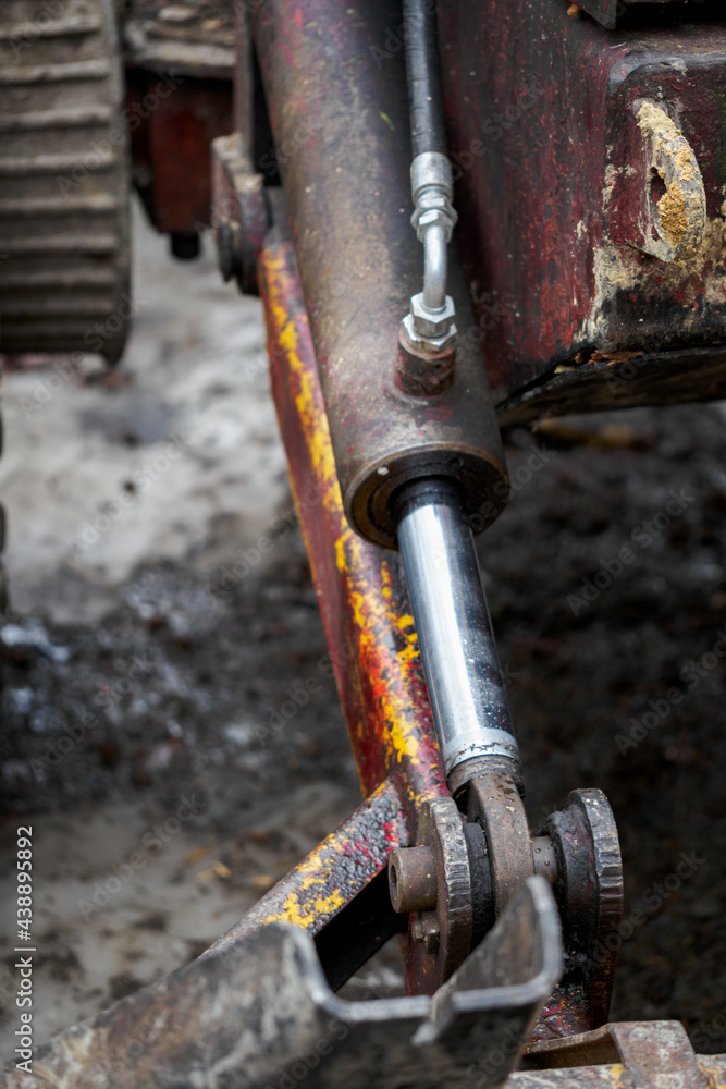 Hydraulic piston on a mining tractor. Hydraulic piston on a mining tractor.