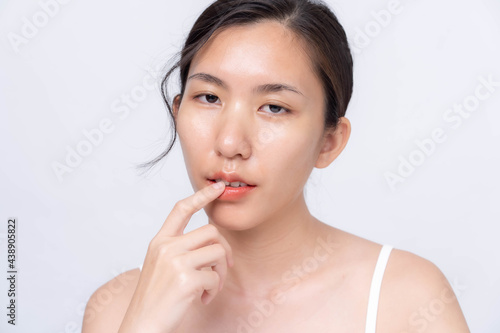 Wallpaper Mural Beautiful young asian woman with clean fresh skin on white background. Asian women portrait. Torontodigital.ca