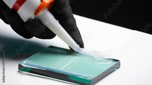  Craftsmen are using silicone adhesives for general and industrial applications.  premium acetoxy silicone sealant photo