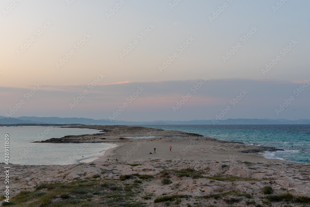 Wonderful sunset on the deserted beach of Ses Illetes on the Island of Formentera in Spain. Wonderful sunset on the deserted beach of Ses Illetes on the Island of Formentera in Spain.