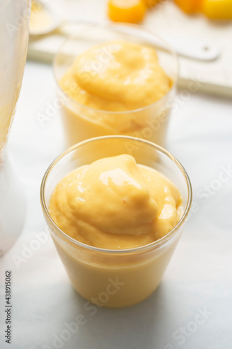 Mango smoothie lassie in glass 