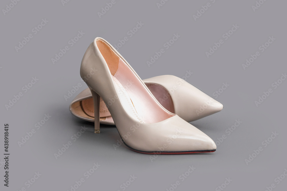 stiletto heels shoes for catalogue. elegant high heels on a grey background. attractive heels images for boutique catalogues. stiletto heels shoes for catalogue. elegant high heels on a grey background. attractive heels images for boutique catalogues.