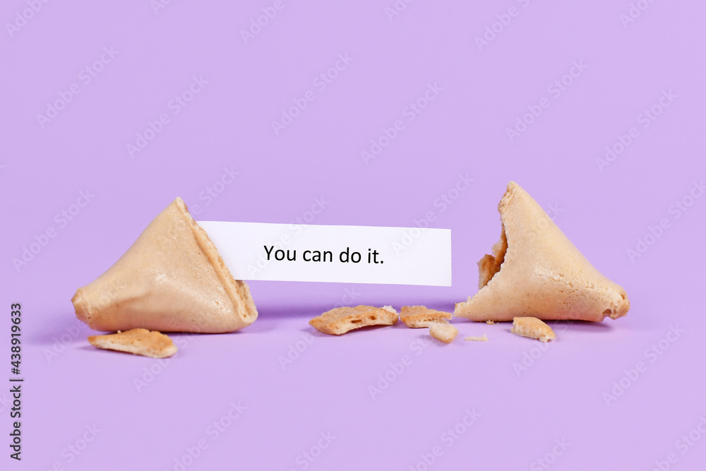 Fortune cookie with motivational text saying 'You can do it' on purple