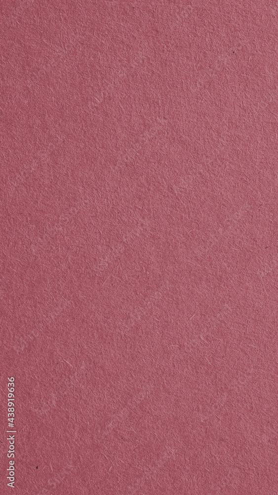 The surface of dark red cardboard. Puce paperboard mobile phone wallpaper. Paper texture with cellulose fibers. Purple-brown vertical background. Beautiful textured backdrop. Top-down. Macro The surface of dark red cardboard. Puce paperboard mobile phone wallpaper. Paper texture with cellulose fibers. Purple-brown vertical background. Beautiful textured backdrop. Top-down. Macro