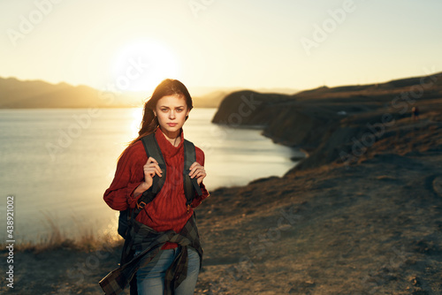 pretty woman hiker outdoors mountains body of water nature