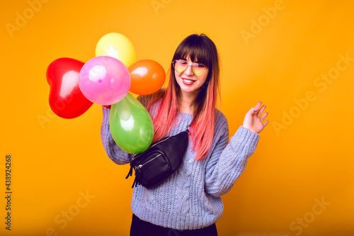 Bright funny portrait of cheerful hipster woman with bright pink hair ©  AnnaHar
