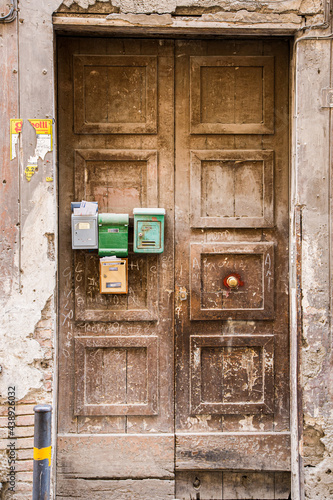 Door with multiple postboxes on in Furore, Italy