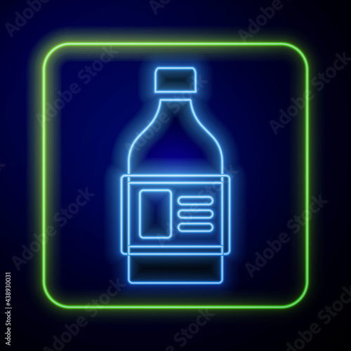 Glowing neon Plastic bottle for laundry detergent, bleach, dishwashing liquid or another cleaning agent icon isolated on blue background. Vector