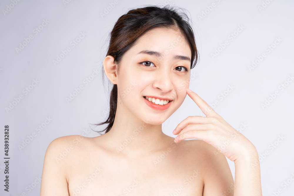 Beautiful young asian woman with clean fresh skin on white background, Beautiful young asian woman with clean fresh skin on white background,