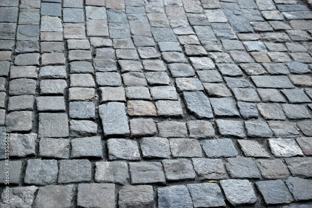 An old stone and tile walkway in the city An old stone and tile walkway in the city