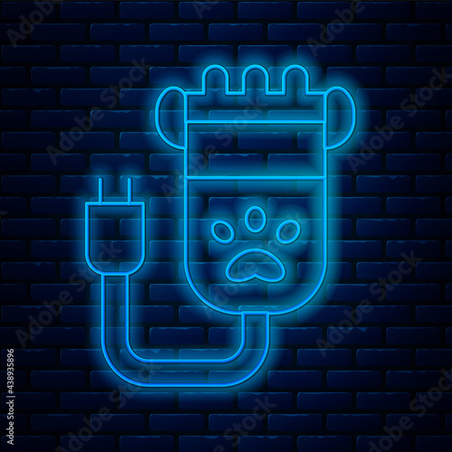 Glowing neon line Hair clipper accessories for pet grooming icon isolated on brick wall background. Vector