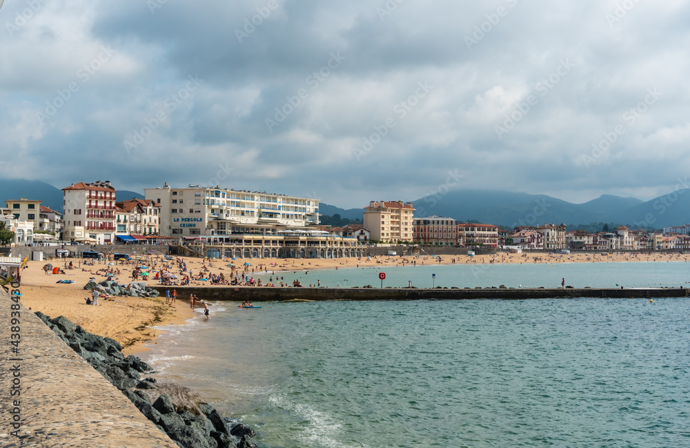 Summer in the Grande Plage in Saint Jean de Luz, holidays in the south of France, French Basque Country. France