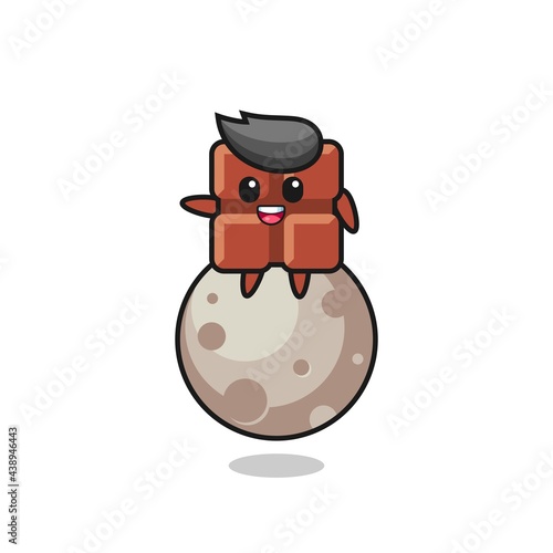 illustration of chocolate bar cartoon sitting on the moon