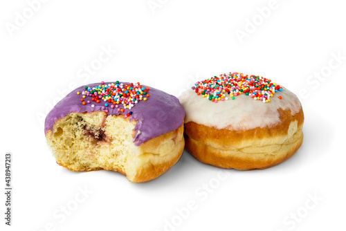 Two colorful donuts with glaze isolated on white background.