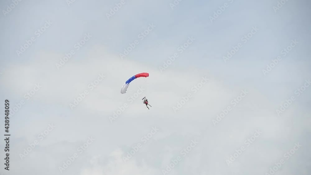 Parachutist on the background of blue sky Parachutist on the background of blue sky
