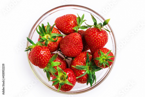 Strawberries in a glass transparent bowl