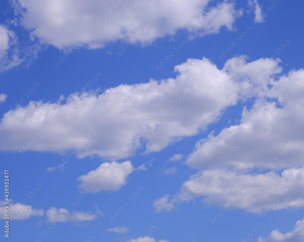 Clouds in the blue sky. Sky background. Sky texture. Clouds in the blue sky. Sky background. Sky texture.