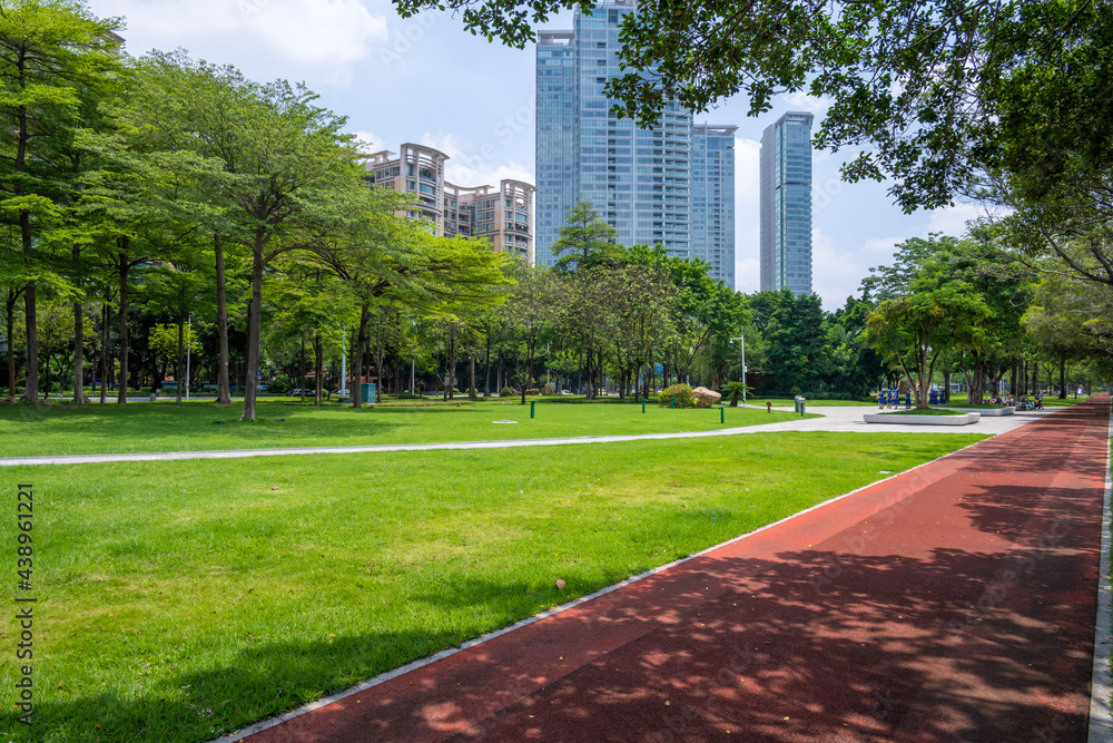 The red way in the park with tree for exercise and relax, in zhujiang park, guangzhou, guangdong China.